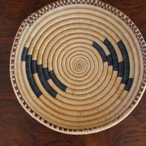 Handwoven Coiled Basket African flat small edge, tan and black, some orange